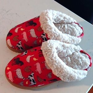 Like new Slippers, no brand listed, red with farm pattern, size 7-8 m